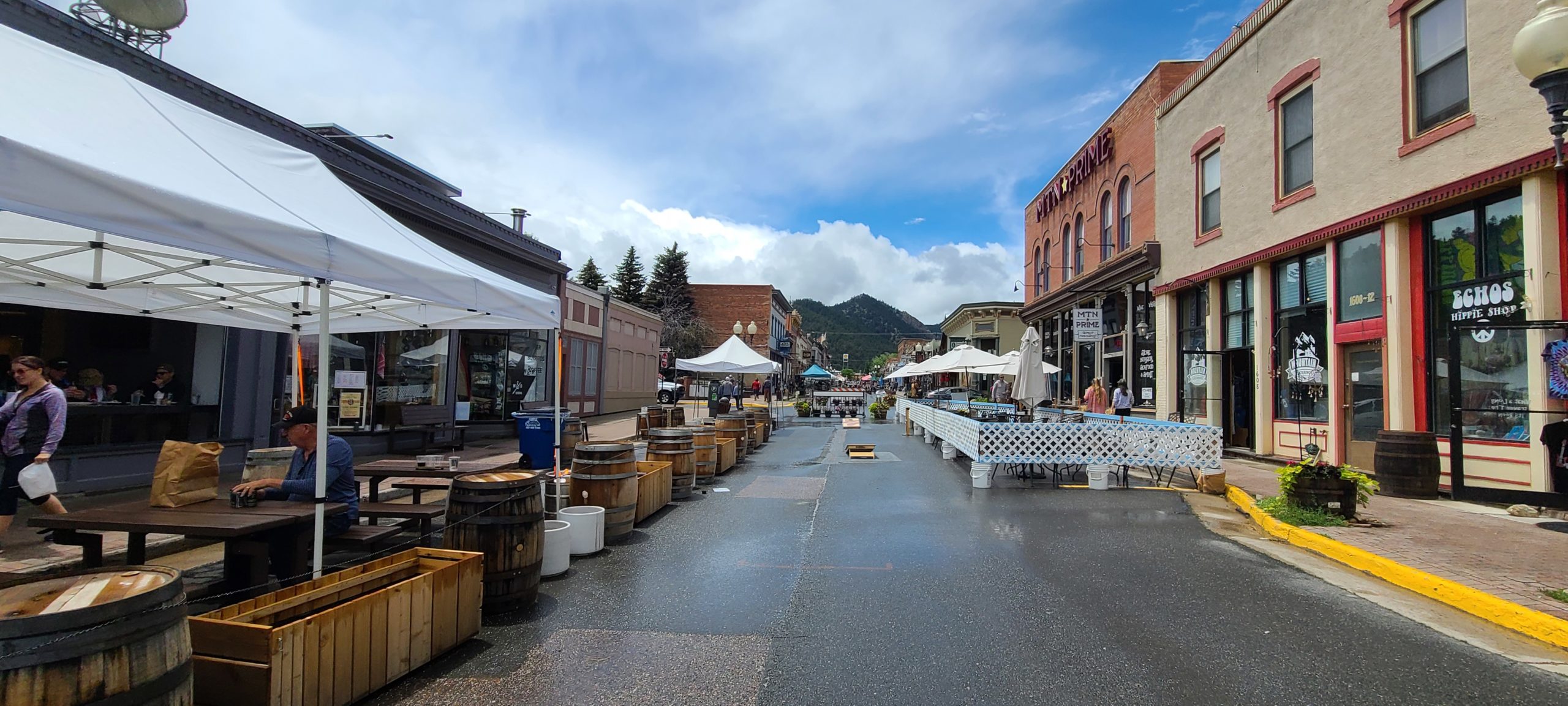 Main Street Idaho Springs lined with shops and outdoor dining
