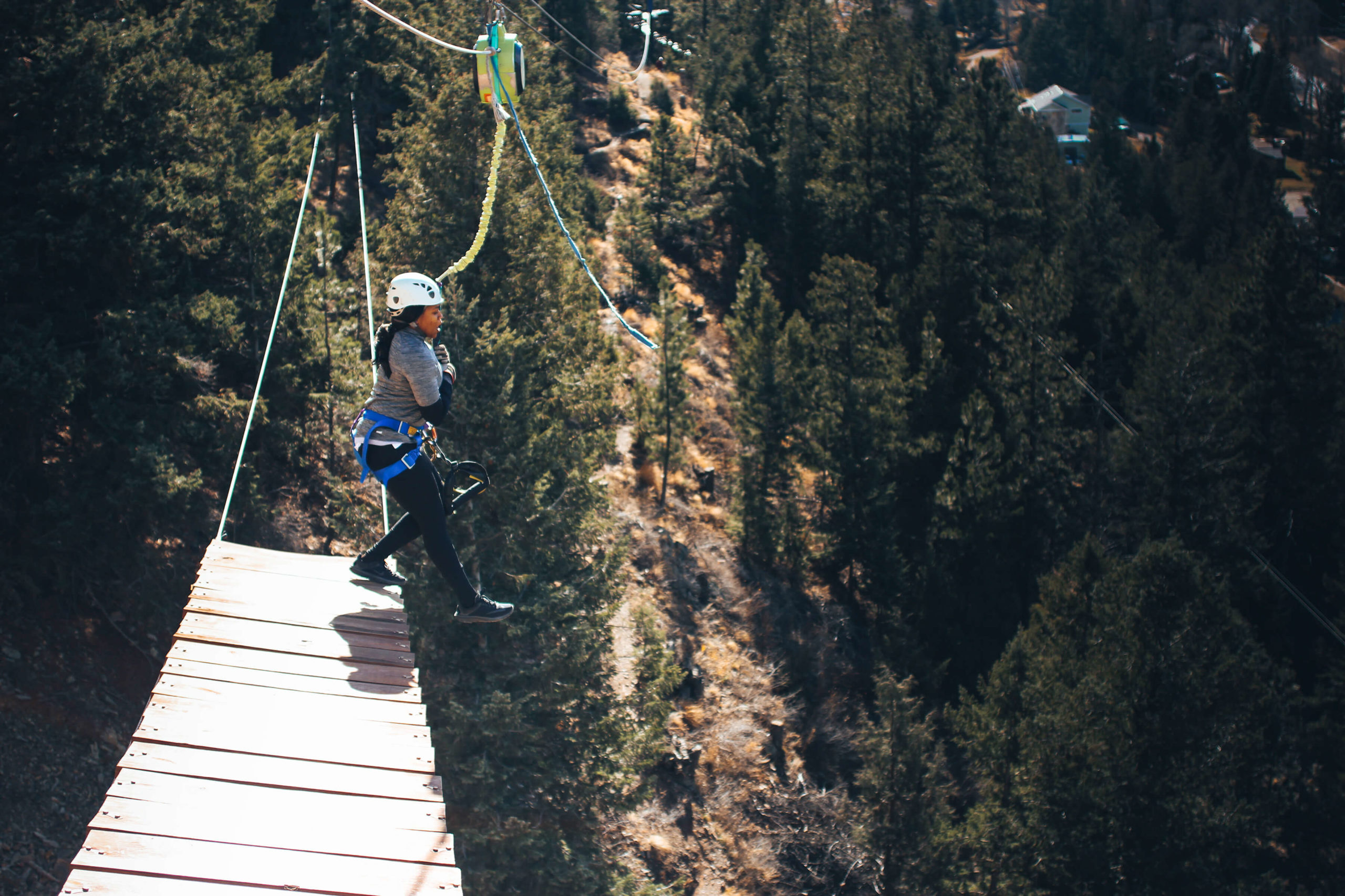 taking the leap on one of of AVA's ziplines outside Denver, Colorado