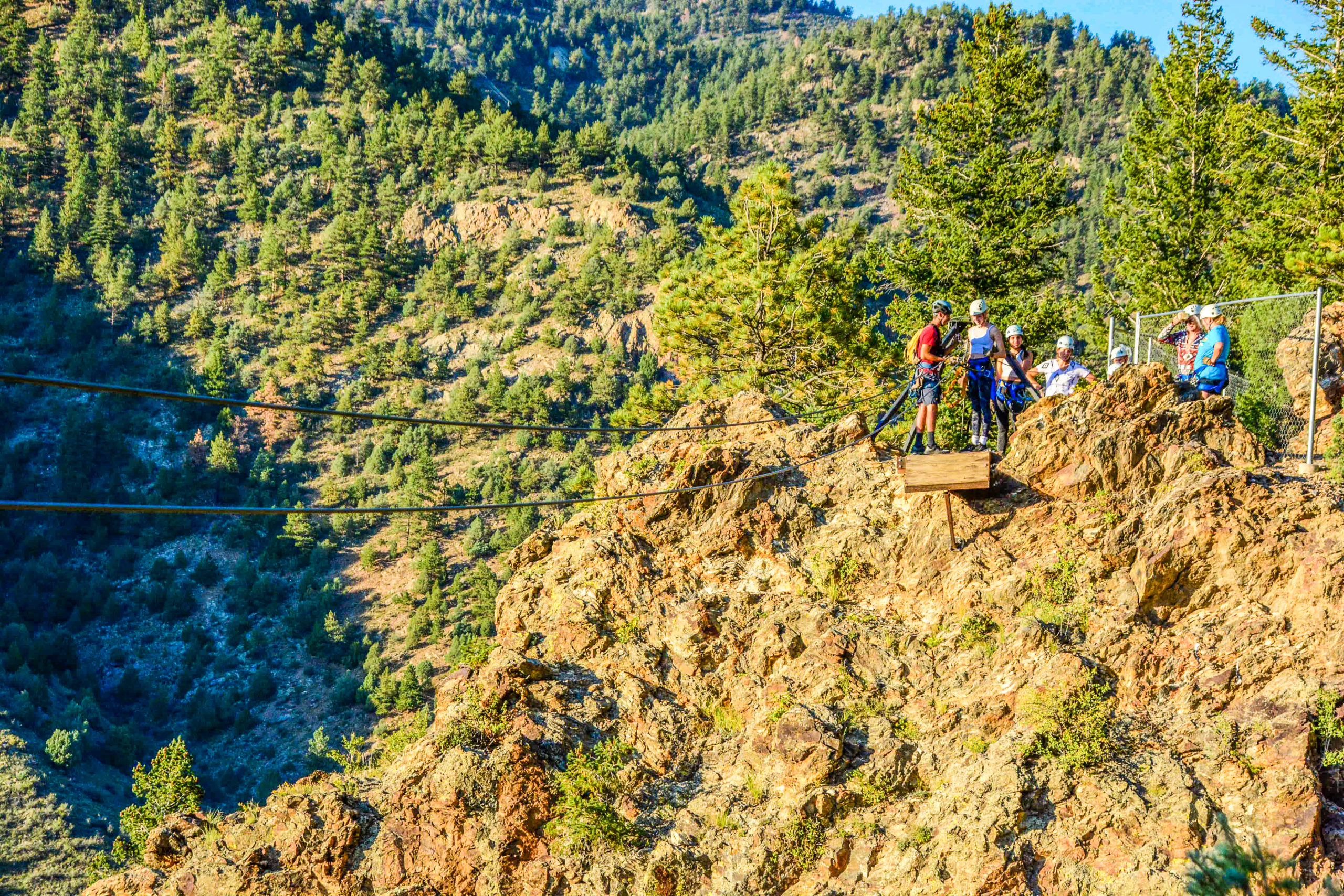 people on the cliffside zipline course in Colorado