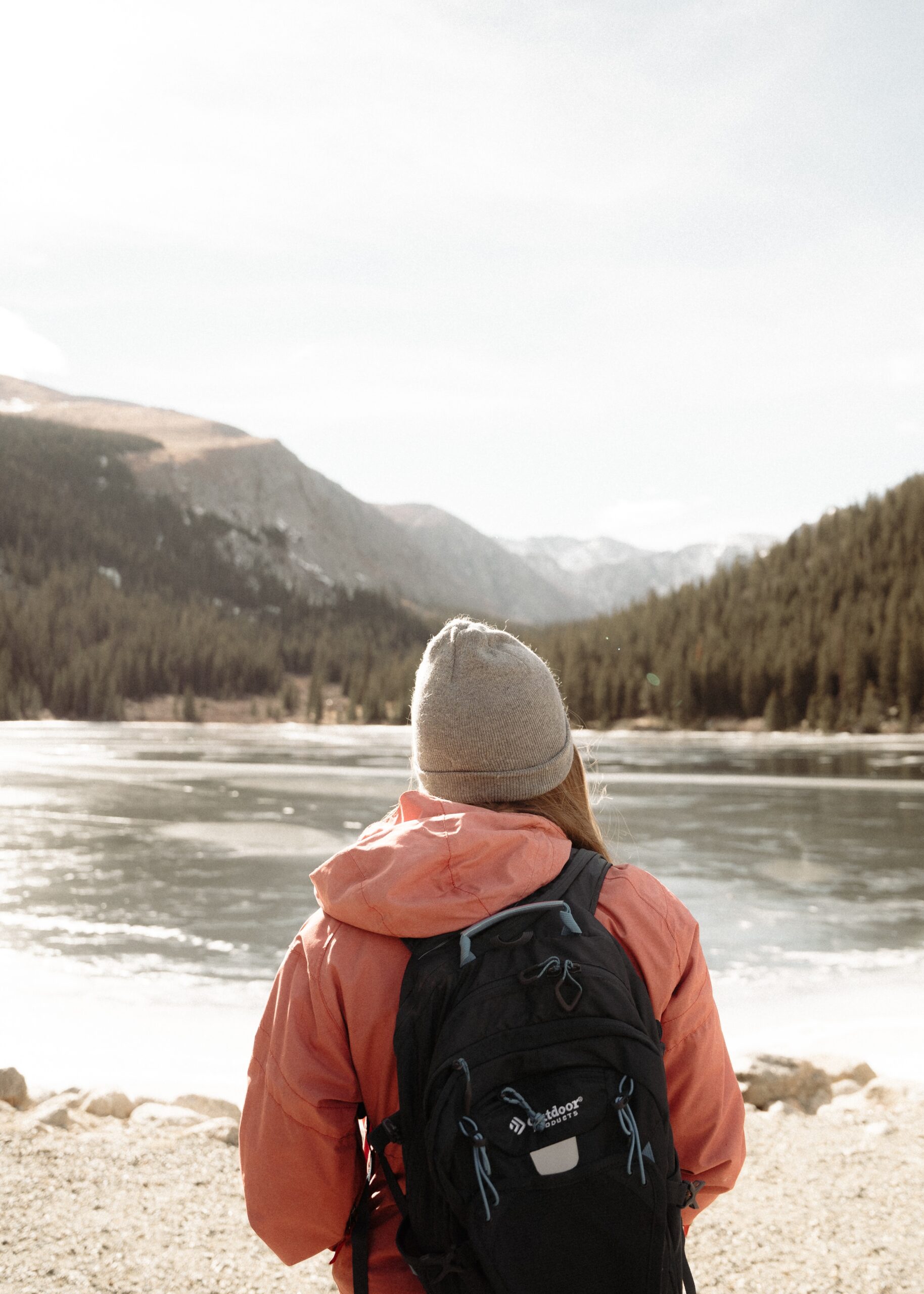 Hiker wearing jacket and backpack