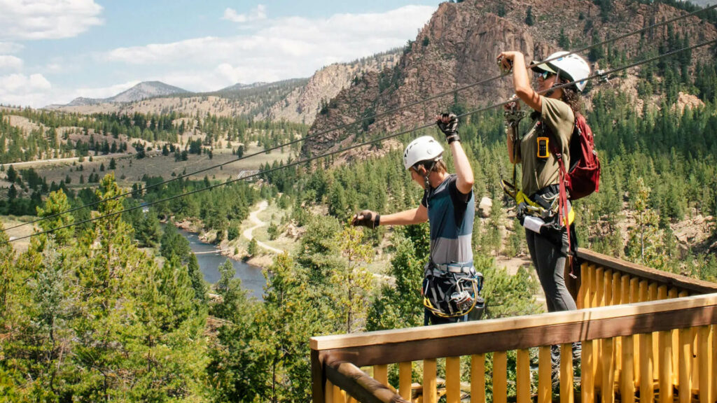 People securing the zipline course.